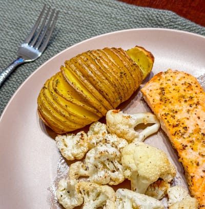 Baked Chicken (or Salmon) with Roasted Cauliflower & Hasselback Potatoes